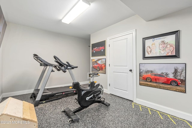 exercise room with baseboards