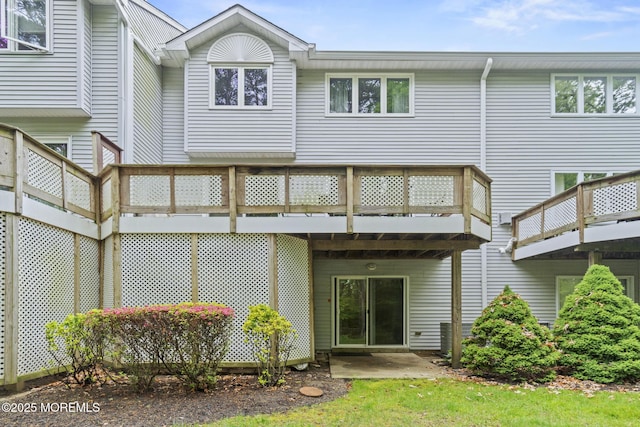 142 Orchid Ct, Toms River, NJ 08753 - back of house featuring a wooden deck