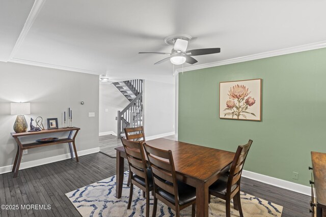 142 Orchid Ct, Toms River, NJ 08753 - dining space with ceiling fan, stairs, ornamental molding, baseboards, and wood finished floors