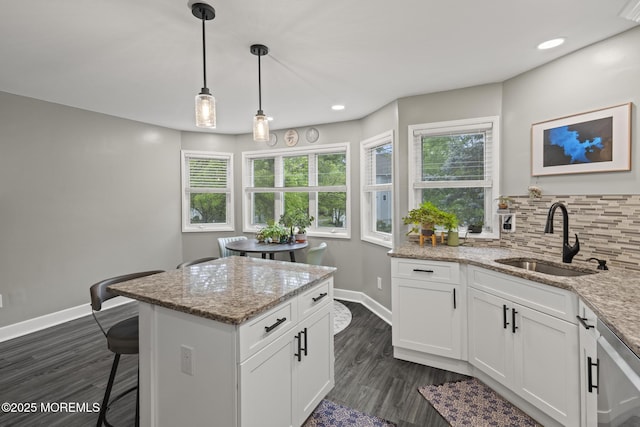 142 Orchid Ct, Toms River, NJ 08753 - kitchen featuring a sink, baseboards, plenty of natural light, decorative backsplash, and recessed lighting