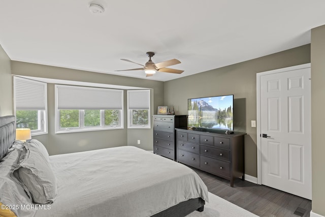 142 Orchid Ct, Toms River, NJ 08753 - bedroom with dark wood-type flooring, a ceiling fan, and baseboards