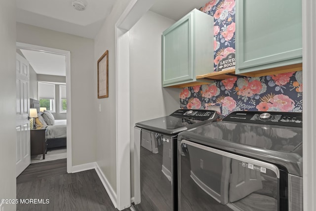 142 Orchid Ct, Toms River, NJ 08753 - washroom featuring cabinet space, washer and dryer, dark wood-style flooring, and baseboards