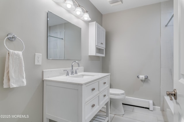 129 Guadeloupe Dr, Toms River, NJ 08757 - full bathroom with baseboard heating, vanity, toilet, tile patterned floors, and tub / shower combination