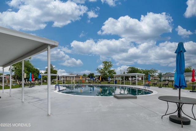 129 Guadeloupe Dr, Toms River, NJ 08757 - community pool featuring a patio