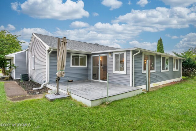 129 Guadeloupe Dr, Toms River, NJ 08757 - rear view of property with a deck, a yard, central AC, and a shingled roof