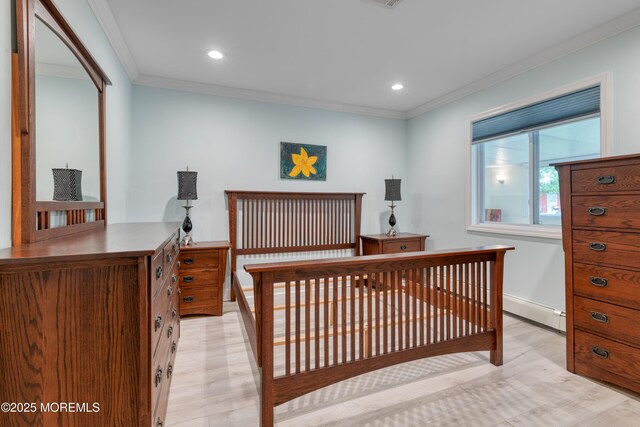 129 Guadeloupe Dr, Toms River, NJ 08757 - bedroom with crown molding, baseboard heating, recessed lighting, light wood finished floors, and baseboards