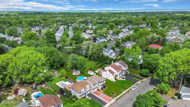 aerial overview of property's location featuring nearby suburban area