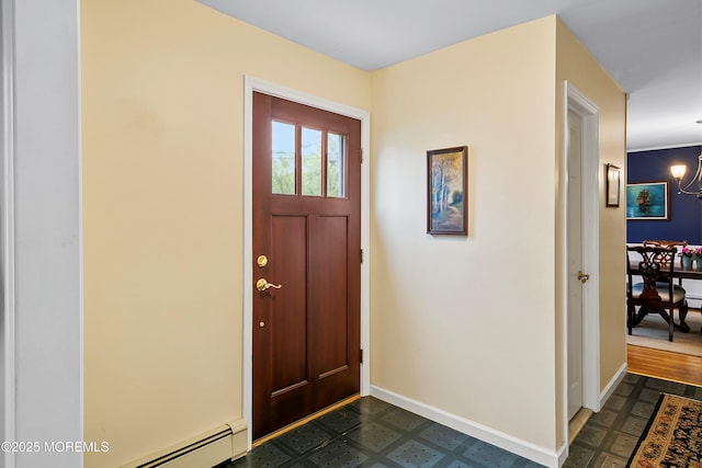foyer with a baseboard radiator, dark flooring, and baseboards