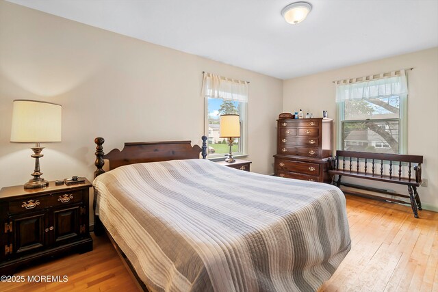 bedroom with light wood-style flooring