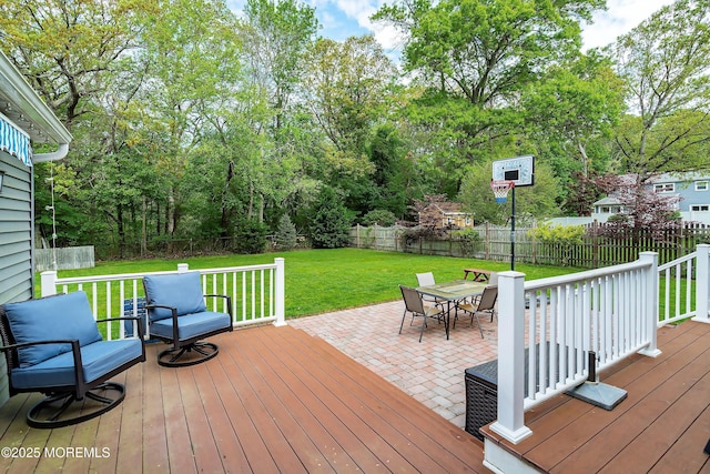 wooden deck featuring a patio area and outdoor dining space