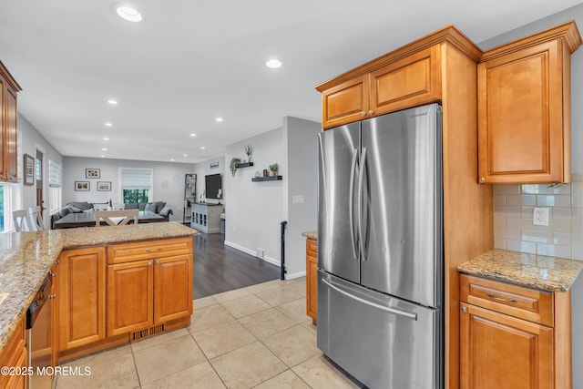 18 Franklin Pkwy, West Long Branch, NJ 07764 - kitchen featuring appliances with stainless steel finishes, open floor plan, light stone countertops, recessed lighting, and decorative backsplash