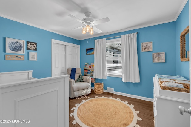 18 Franklin Pkwy, West Long Branch, NJ 07764 - bedroom featuring baseboards, a closet, crown molding, dark wood-type flooring, and ceiling fan