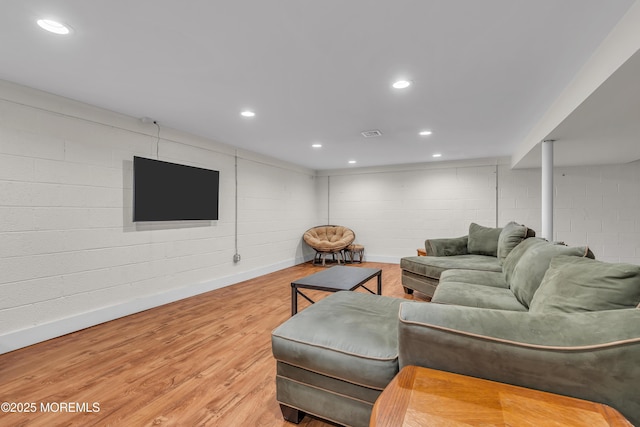 18 Franklin Pkwy, West Long Branch, NJ 07764 - living room with wood finished floors, baseboards, recessed lighting, and concrete block wall
