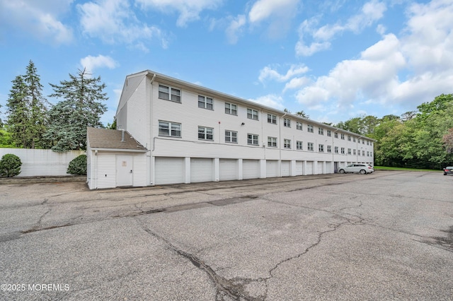 3403 Bridge Ave Unit 2, Point Pleasant, NJ 08742 - view of building exterior featuring community garages