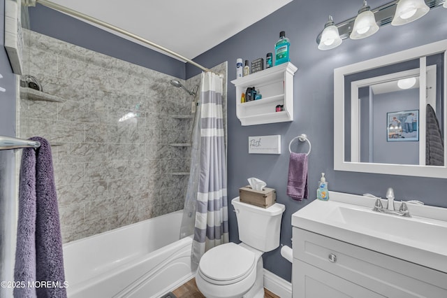 3403 Bridge Ave Unit 2, Point Pleasant, NJ 08742 - bathroom featuring shower / tub combo, toilet, vanity, baseboards, and wood finished floors