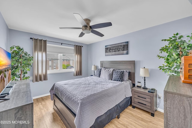 3403 Bridge Ave Unit 2, Point Pleasant, NJ 08742 - bedroom with light wood-style flooring, baseboards, and a ceiling fan
