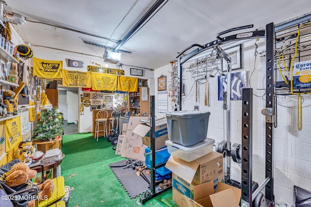 3403 Bridge Ave Unit 2, Point Pleasant, NJ 08742 - basement with a garage, concrete block wall, and carpet flooring