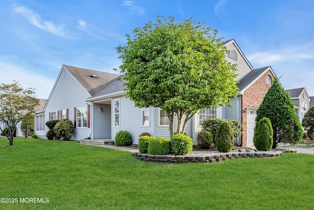 20 Abergele Dr, Toms River, NJ 08757 - view of property hidden behind natural elements featuring a garage, a front yard, and a shingled roof