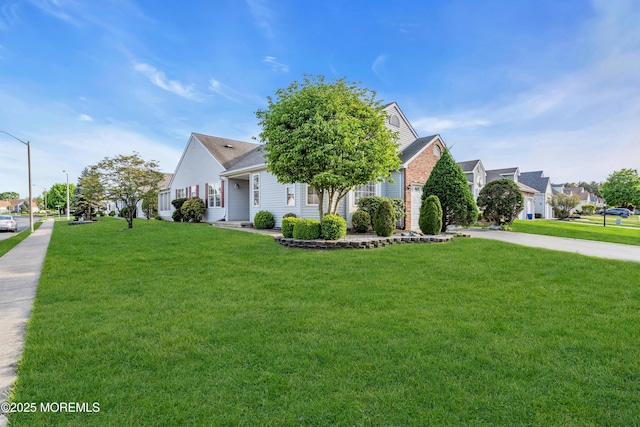 20 Abergele Dr, Toms River, NJ 08757 - view of front of home with driveway and a front lawn