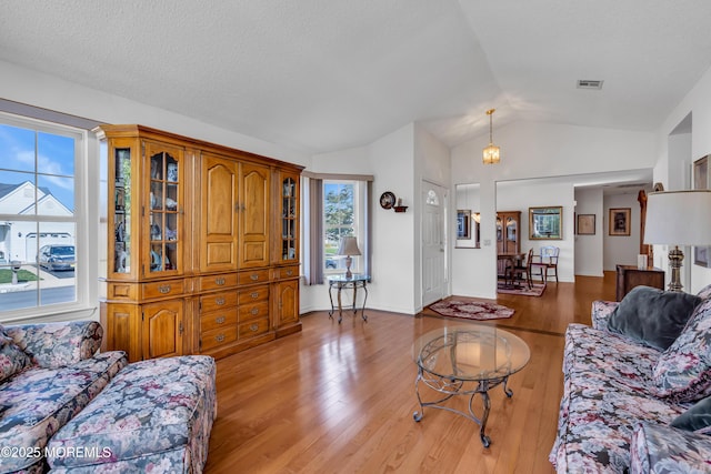 20 Abergele Dr, Toms River, NJ 08757 - living room with lofted ceiling and light wood-style floors