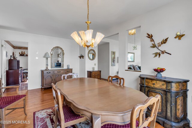 20 Abergele Dr, Toms River, NJ 08757 - dining area featuring a chandelier and wood finished floors
