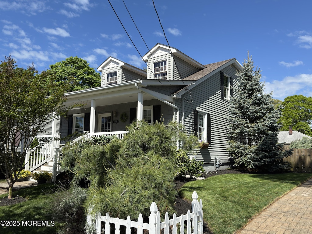 1409 Buckner St, Point Pleasant, NJ 08742 - view of front of home featuring a porch