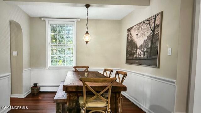 46 Grand Tour, Highlands, NJ 07732 - dining room with a baseboard radiator, dark wood-style flooring, plenty of natural light, and baseboards