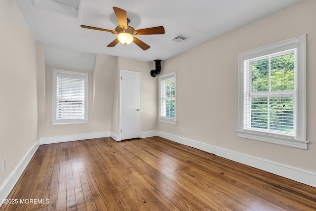 46 Grand Tour, Highlands, NJ 07732 - spare room with a ceiling fan, wood-type flooring, and baseboards