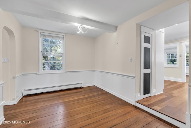 46 Grand Tour, Highlands, NJ 07732 - unfurnished room featuring a baseboard radiator, hardwood / wood-style floors, and baseboards