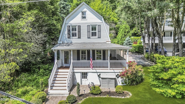 46 Grand Tour, Highlands, NJ 07732 - view of front of property featuring covered porch, a gambrel roof, stairway, and a front lawn