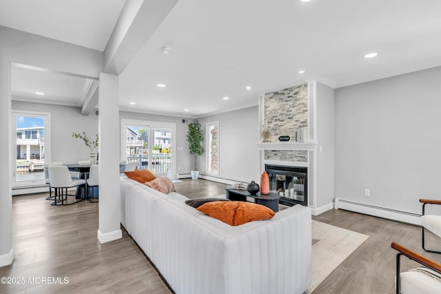 3 Toledo Dr, Brick, NJ 08723 - living room with a baseboard radiator, healthy amount of natural light, ornamental molding, a fireplace, and recessed lighting