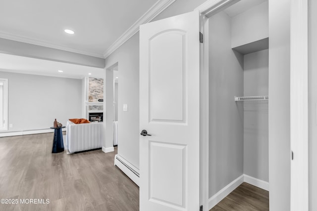 3 Toledo Dr, Brick, NJ 08723 - corridor featuring baseboard heating, crown molding, wood finished floors, and recessed lighting