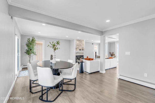 3 Toledo Dr, Brick, NJ 08723 - dining space featuring a baseboard radiator, recessed lighting, light wood finished floors, a fireplace, and ornamental molding