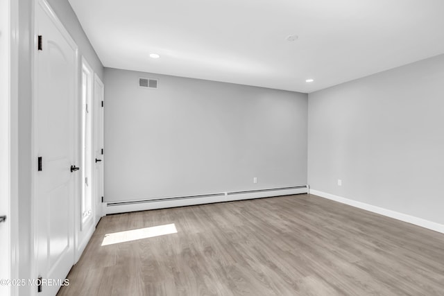 3 Toledo Dr, Brick, NJ 08723 - unfurnished room with baseboard heating, wood finished floors, and recessed lighting