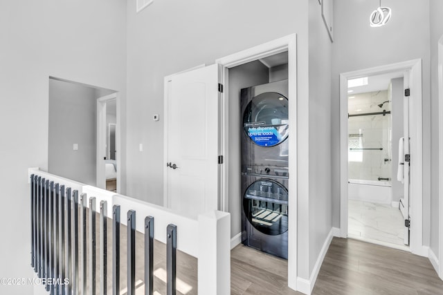 3 Toledo Dr, Brick, NJ 08723 - hallway featuring stacked washer / drying machine and wood finished floors