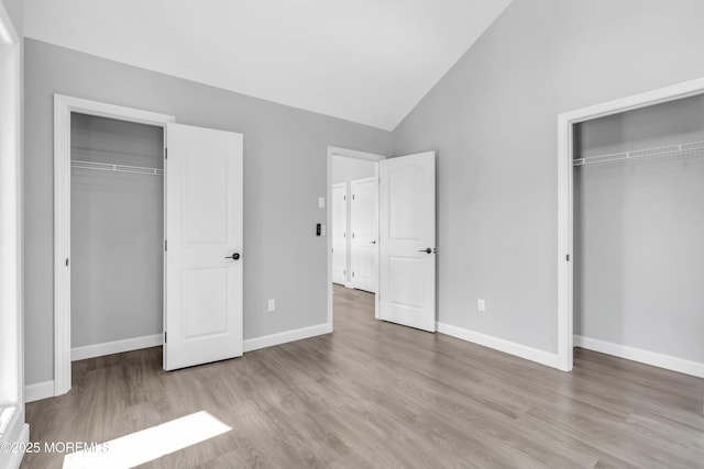 3 Toledo Dr, Brick, NJ 08723 - unfurnished bedroom with wood finished floors, a closet, and high vaulted ceiling