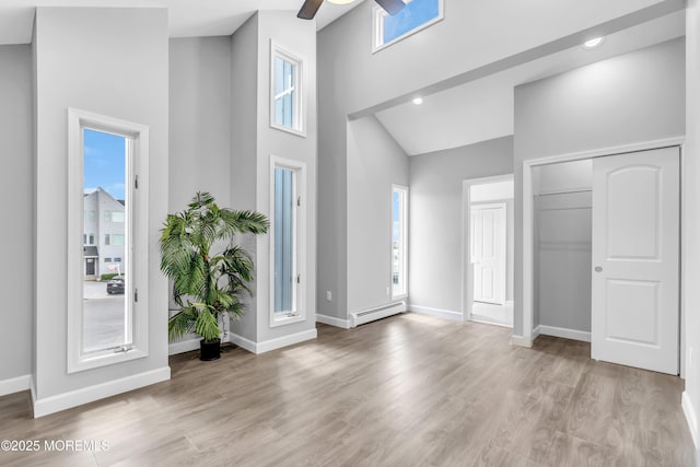 3 Toledo Dr, Brick, NJ 08723 - foyer with baseboard heating, plenty of natural light, a high ceiling, and a ceiling fan