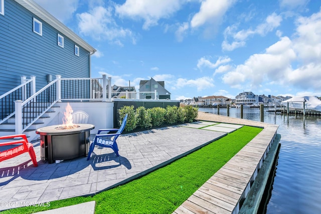 3 Toledo Dr, Brick, NJ 08723 - view of patio / terrace featuring an outdoor fire pit, a water view, a dock, and a residential view