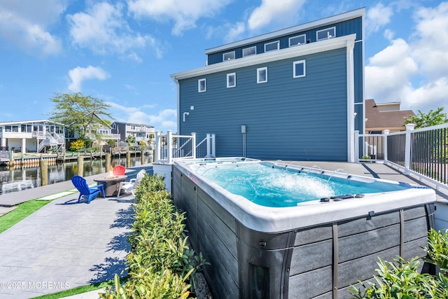 3 Toledo Dr, Brick, NJ 08723 - view of pool featuring a hot tub, a water view, and a patio area