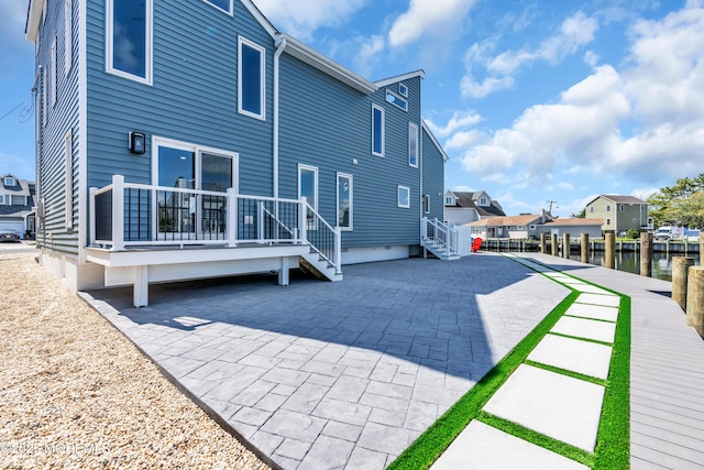 3 Toledo Dr, Brick, NJ 08723 - back of house with a patio area, a water view, and a residential view