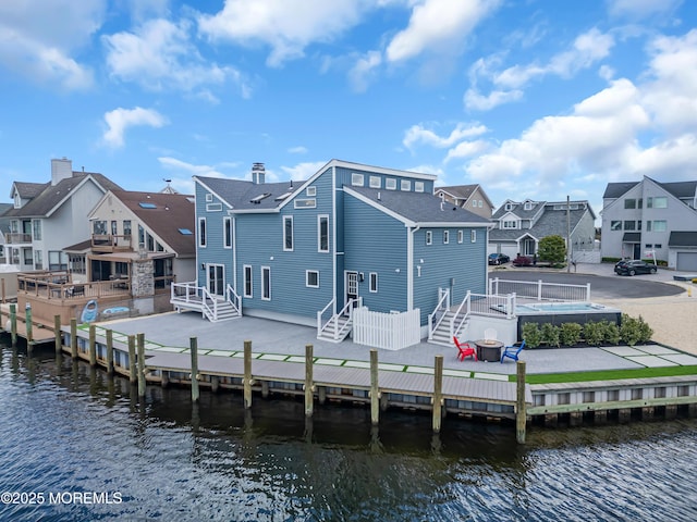 3 Toledo Dr, Brick, NJ 08723 - back of house with a residential view and a water view