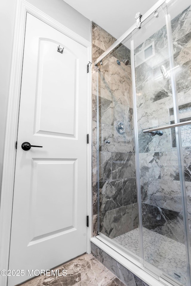 3 Toledo Dr, Brick, NJ 08723 - full bathroom featuring a marble finish shower and marble look tiles
