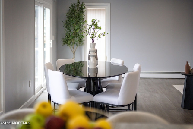 3 Toledo Dr, Brick, NJ 08723 - dining area with a baseboard radiator and wood finished floors
