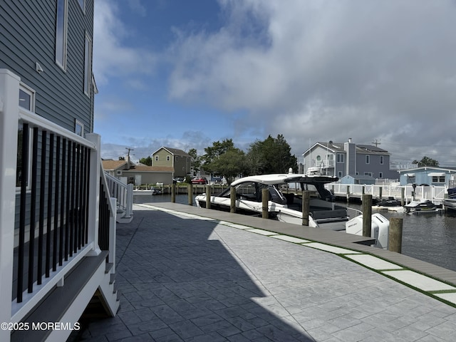 3 Toledo Dr, Brick, NJ 08723 - view of patio with a boat dock, a residential view, and a water view