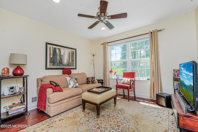 178 Loganberry Ln, Freehold, NJ 07728 - living room with wood finished floors, ceiling fan, recessed lighting, and baseboards