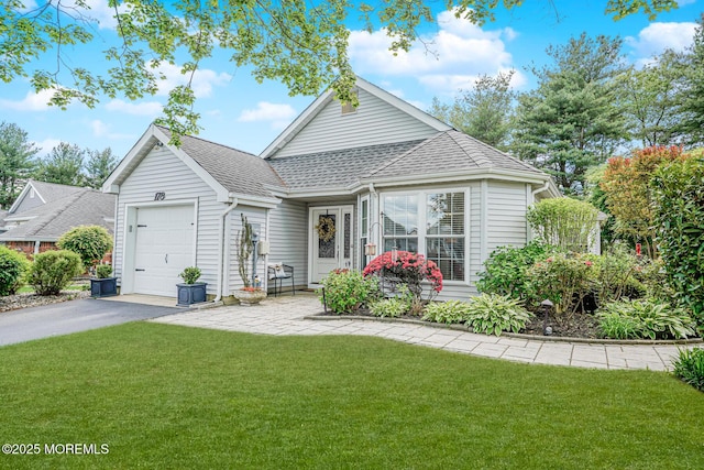 178 Loganberry Ln, Freehold, NJ 07728 - view of front of property with a garage, a shingled roof, asphalt driveway, and a front yard