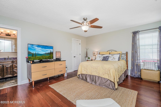 178 Loganberry Ln, Freehold, NJ 07728 - bedroom featuring dark wood-type flooring, a ceiling fan, baseboards, and a textured ceiling