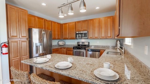 43 W Susquehanna Dr, Little Egg Harbor, NJ 08087 - kitchen with appliances with stainless steel finishes, a sink, light stone countertops, a breakfast bar, and recessed lighting