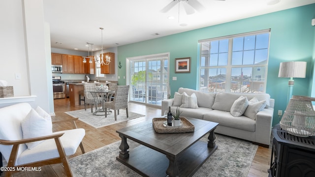 43 W Susquehanna Dr, Little Egg Harbor, NJ 08087 - living area featuring a chandelier, ceiling fan, recessed lighting, and light wood-type flooring