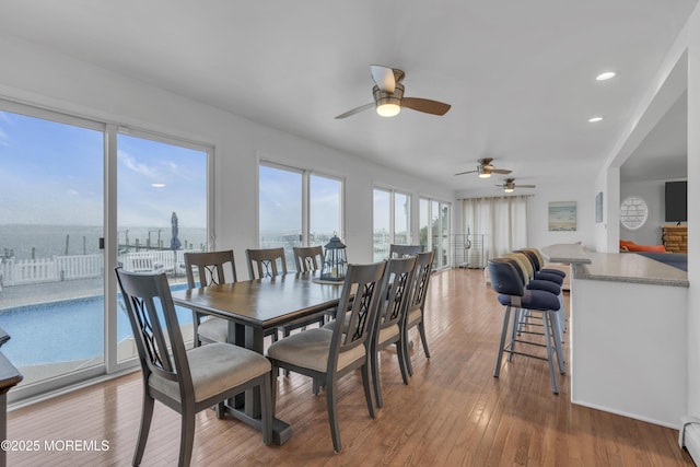 687 Princeton Ave, Brick, NJ 08724 - dining area featuring a ceiling fan, baseboard heating, light wood finished floors, and recessed lighting